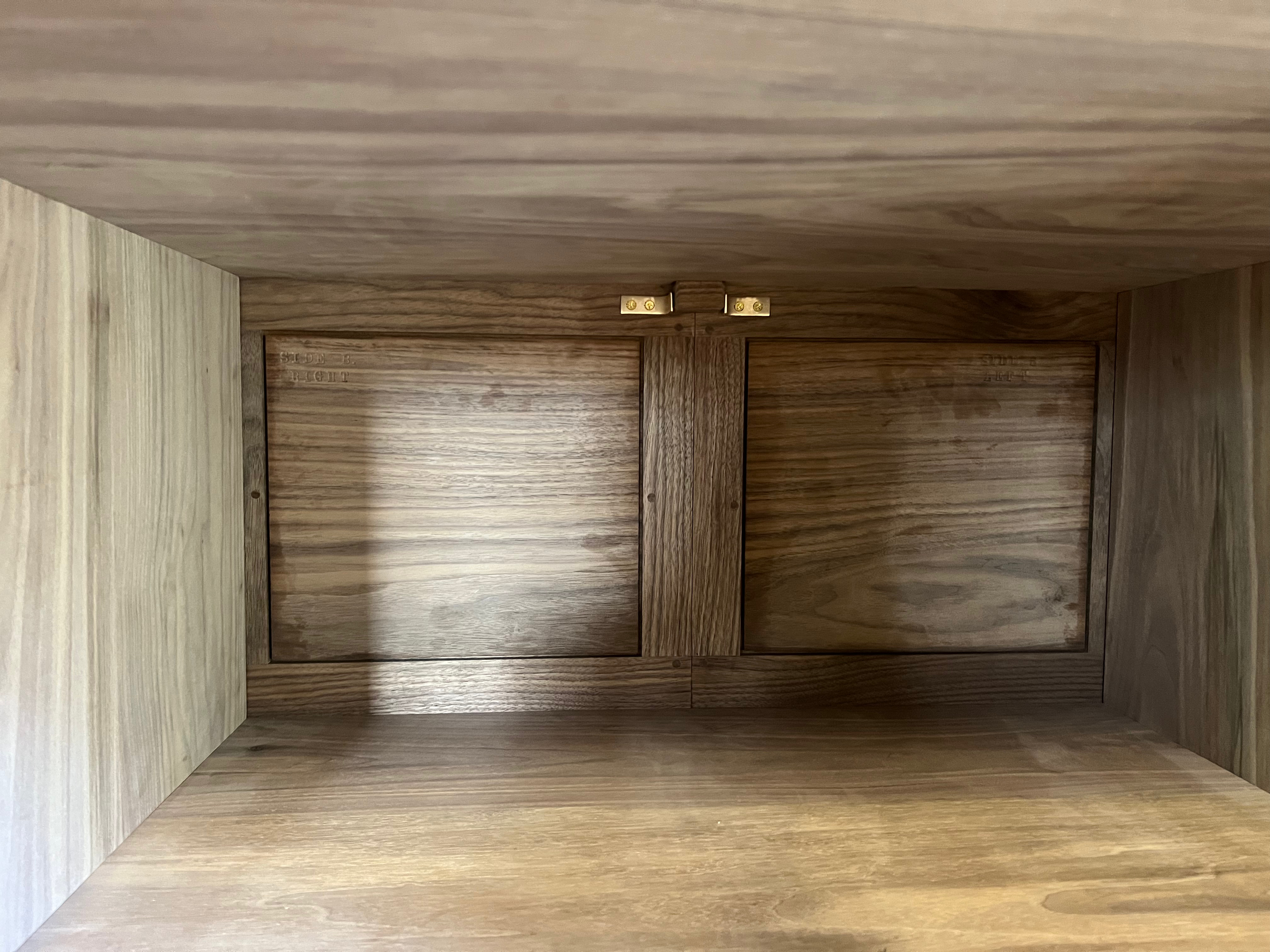Brass stops inside cabinet